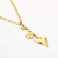 Floral Heart Necklace met gouden bloem en hart-hanger – Naomé Boutique