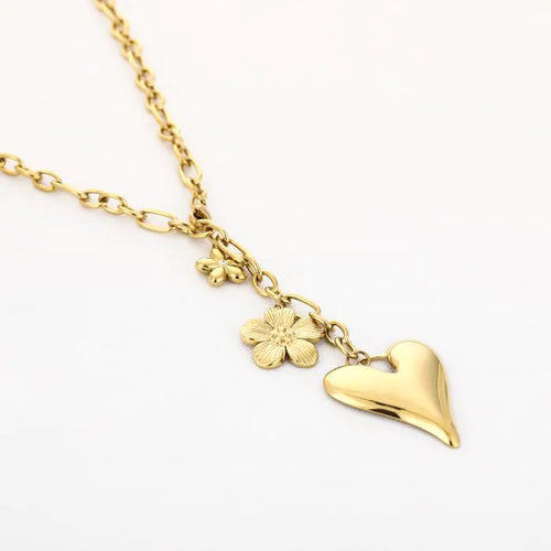 Floral Heart Necklace met gouden bloem en hart-hanger – Naomé Boutique